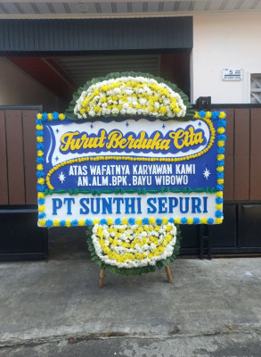 Papan Bunga Duka di Tapian Nauli