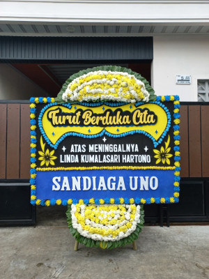 Papan Bunga Duka di Tapian Nauli