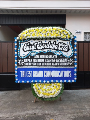 Papan Bunga Duka di Tapian Nauli